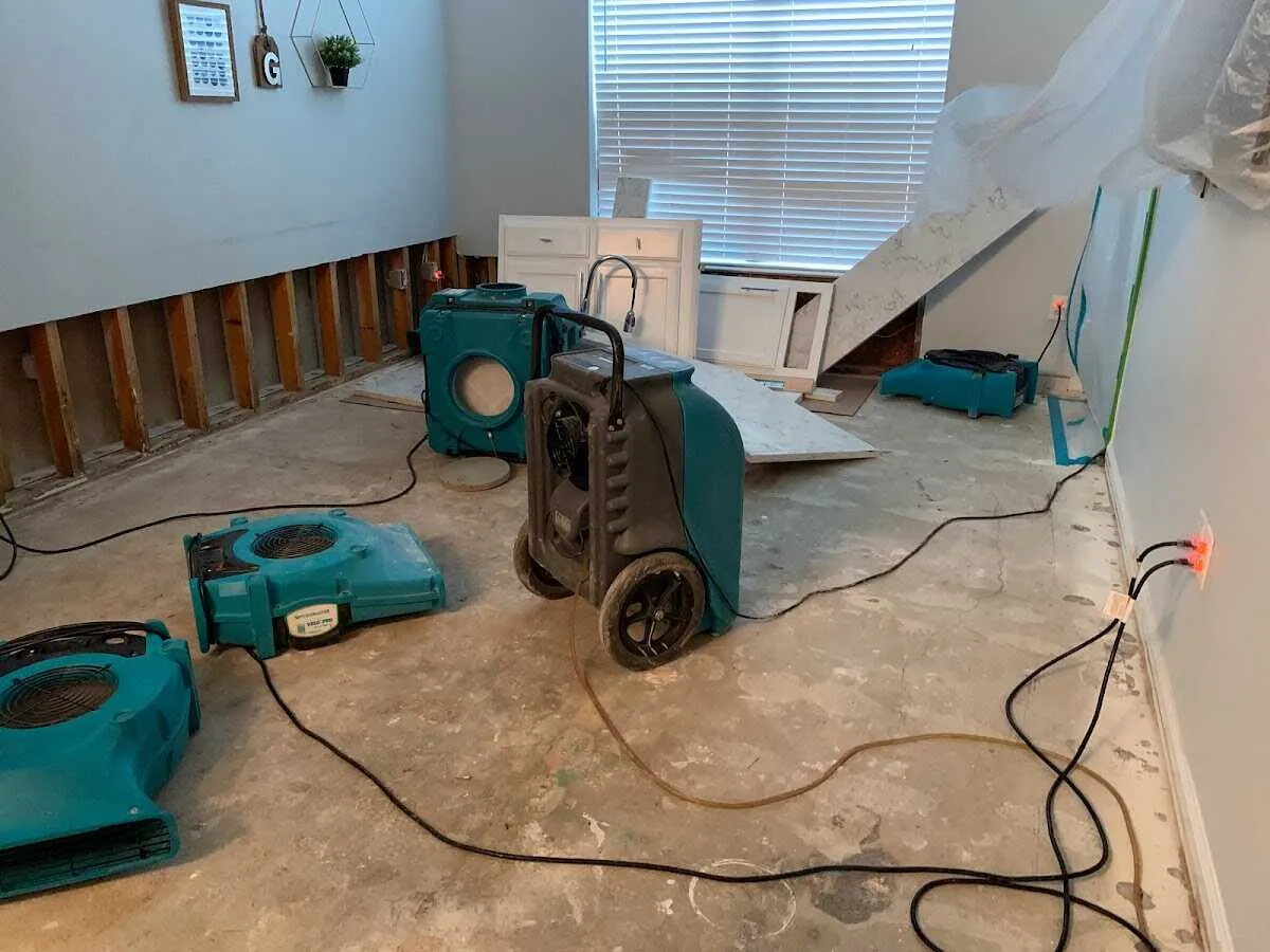 Dehumidifier in flood-cut room for Water Damage Restoration in Parkwood